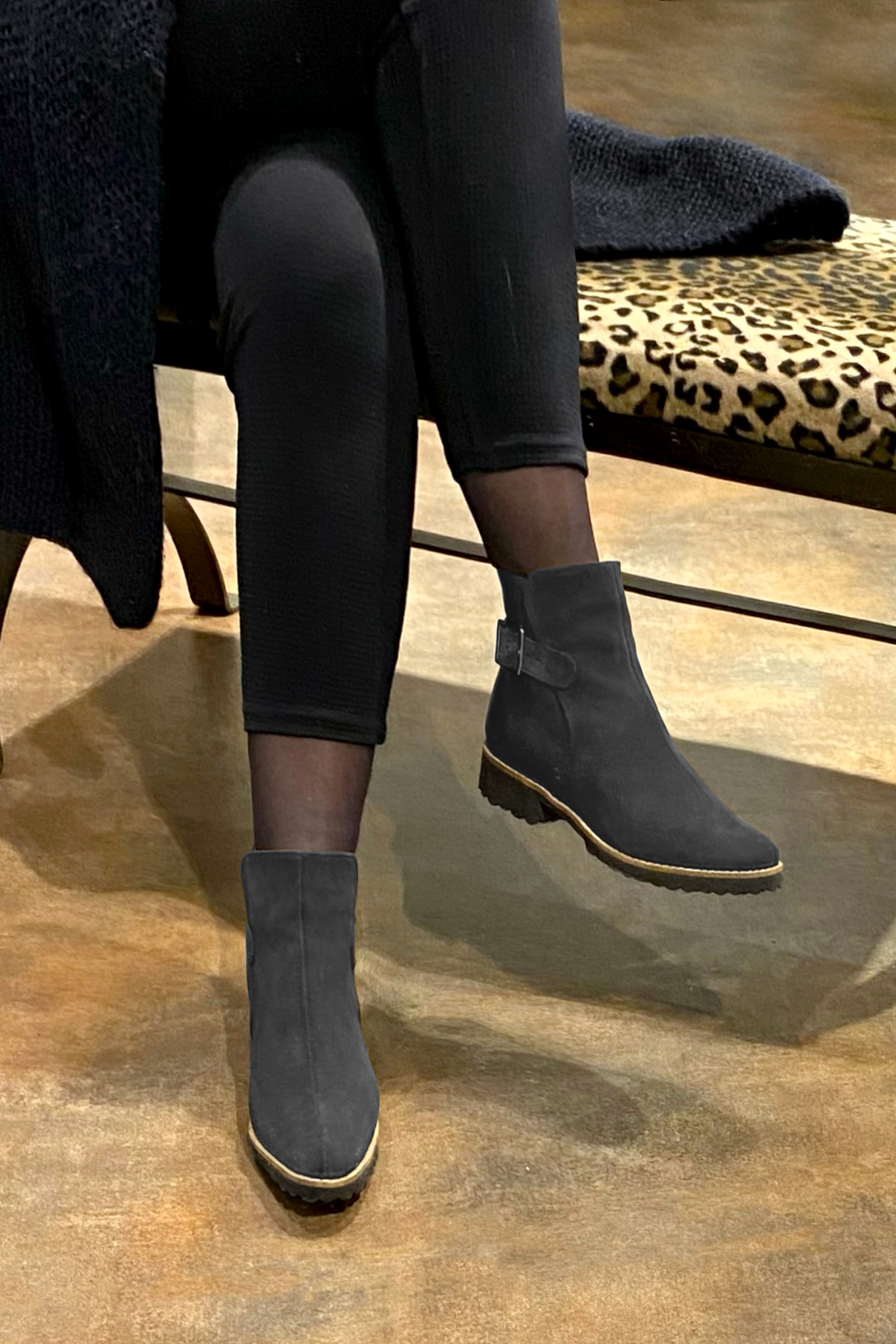 Dark grey women's ankle boots with buckles at the back. Round toe. Flat rubber soles. Worn view - Florence KOOIJMAN